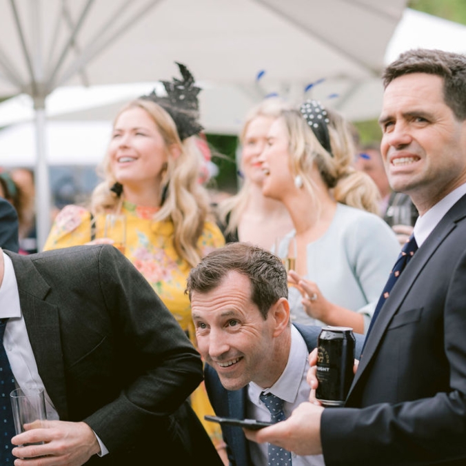 Men in suits at event